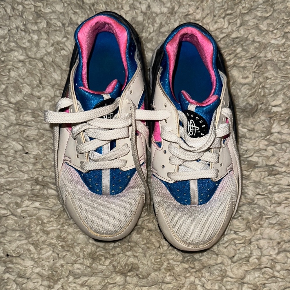 Kids Size 4.5Y White and Blue Nike Sneakers.